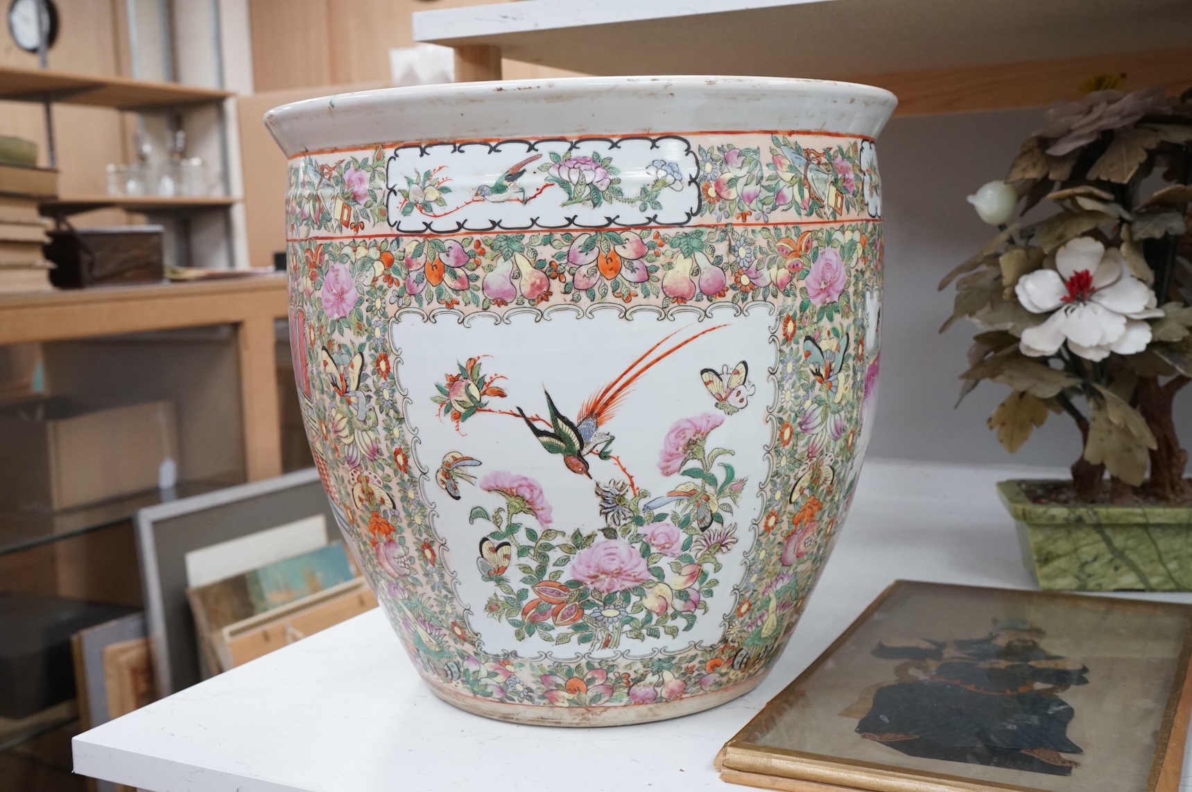 A Chinese famille Rose goldfish bowl enamelled with figures, butterflies and flowers, 41cm in diameter